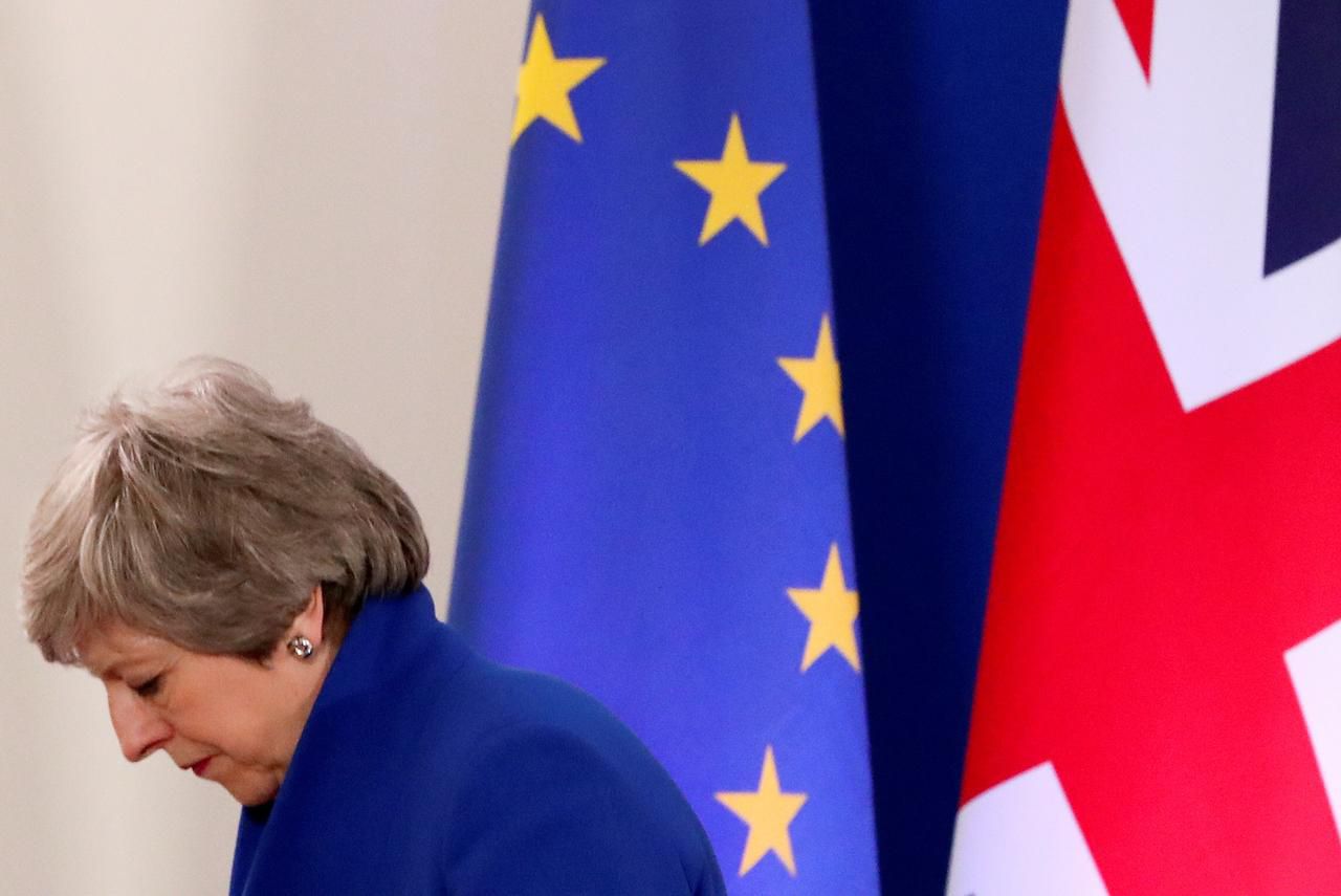 该走人了英首相梅的英退最后努力遭全面否决